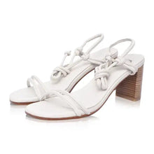 Load image into Gallery viewer, THE ARYA handcrafted leather block heel wrap sandal in white side view— LUXUL COLLECTIVE