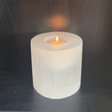Load image into Gallery viewer, THE NURA handcrafted Saharan selenite votive candle holder ondark surface — LUXUL COLLECTIVE