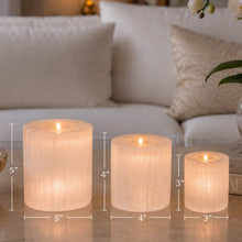 Load image into Gallery viewer, Three selenite candle holders in three inch small 4 inch medium and five inch large sizes on a white surface — THE NURA — LUXUL COLLECTIVE